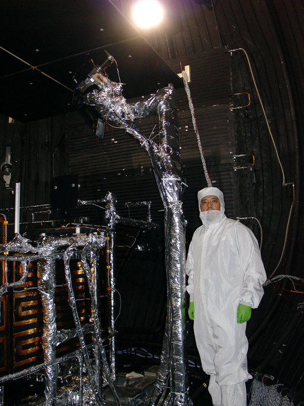 Park McGraw inside 30 foot diameter thermal vacuum chamber while perform optical tests for the STSS satellite